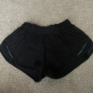 black lululemon shorts size 2, worn but definitely still have some life in them